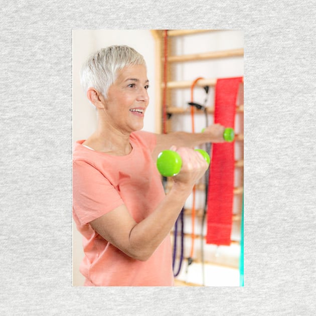 Senior woman exercising with dumbbells (F024/9971) by SciencePhoto
